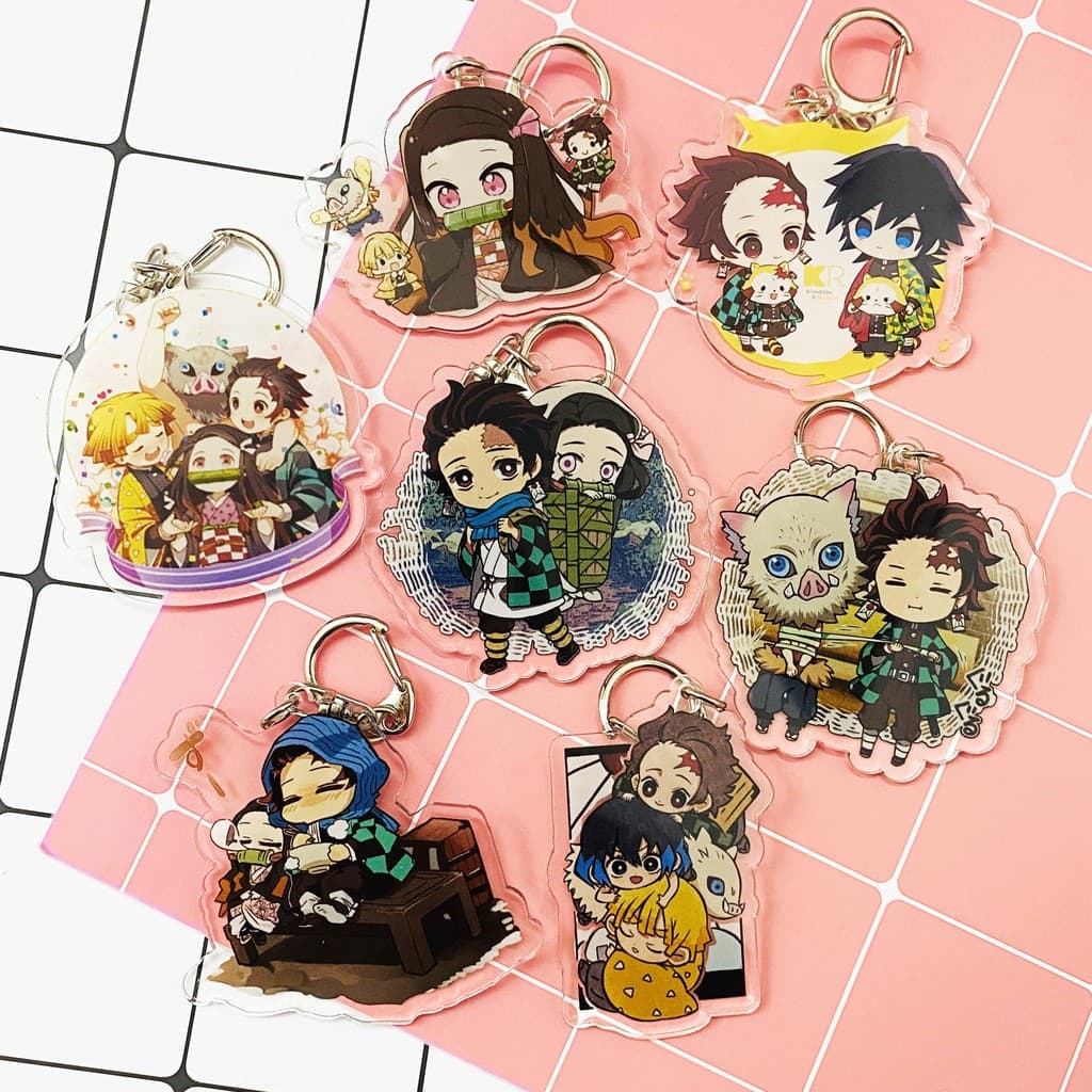(mua 1 tặng 1) ( Mica ) Móc khóa Kimetsu no Yaiba Thanh gươm diệt quỷ ver nền cute quà tặng dễ thương anime chibi