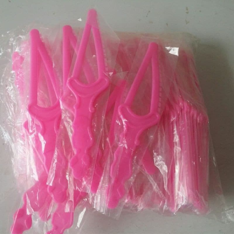 Bịch 100 dao gấu hồng cắt bánh kem