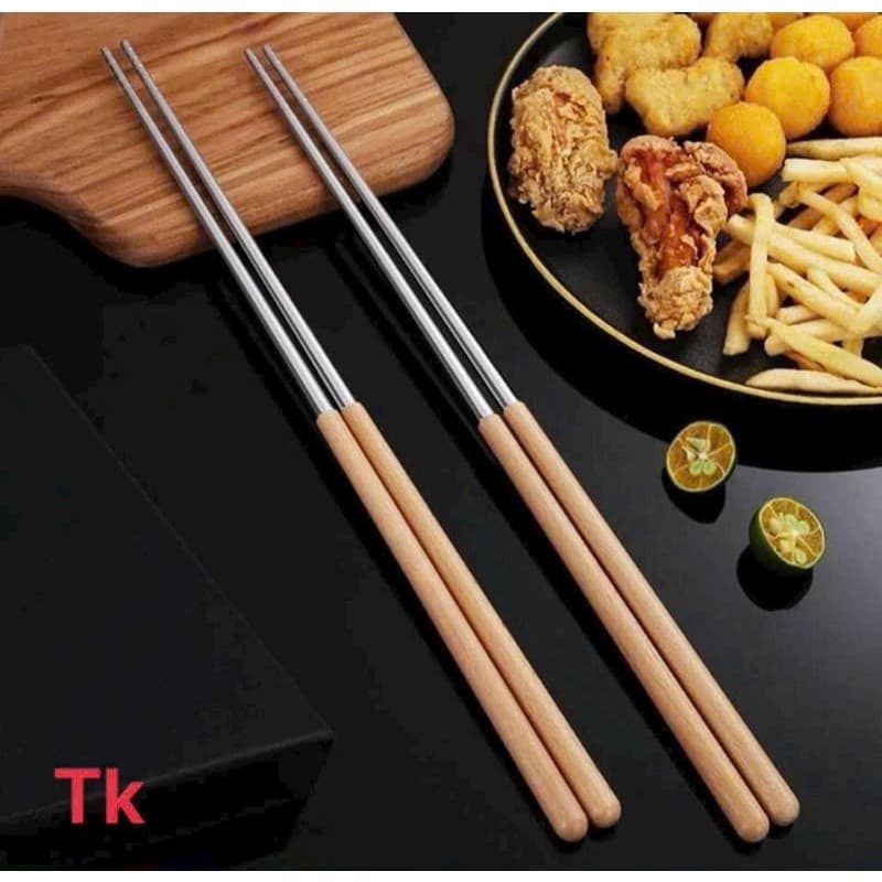 ĐŨA XÀO RAU DÀI BẰNG INOX CÁN GỖ