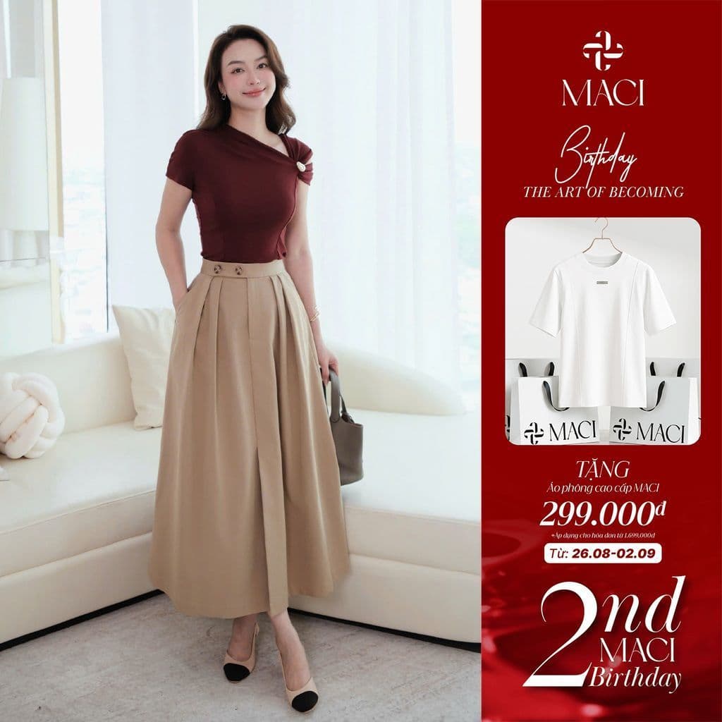 Chân Váy Kaki Xếp Li Xoè Cạp Quai Nhê Khuy Sừng MACI MCVCVBE0395 Thời Trang Nữ Thiết Kế Độc Quyền