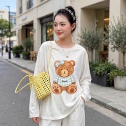 Áo thun cổ tròn tay dài form rộng chất thun giấy xước mỏng mât in gấu cài nơ  TG BEGAU 7 9