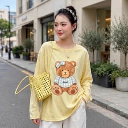 Áo thun cổ tròn tay dài form rộng chất thun giấy xước mỏng mât in gấu cài nơ  TG BEGAU 7 4