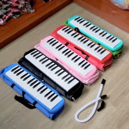 Đàn kèn 32 phím melodica , đàn kèn học sinh các màu xanh, đỏ , đen hồng dành cho bé. 1