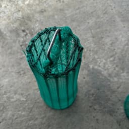 Chọ rỏ chặn rác ống bọng phi (250 giảm dần về 100) chất liệu kẽm, bọc lưới xanh. Dùng chắn rác cấp thoát nước 6