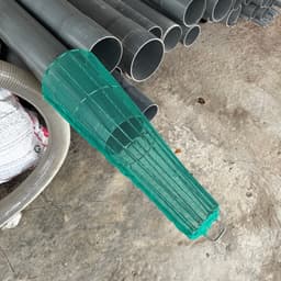 Chọ rỏ chặn rác ống bọng phi (250 giảm dần về 100) chất liệu kẽm, bọc lưới xanh. Dùng chắn rác cấp thoát nước 4
