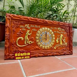 Tranh đồng hồ gỗ hương đỏ khung đục kích thước 41*81cm 1