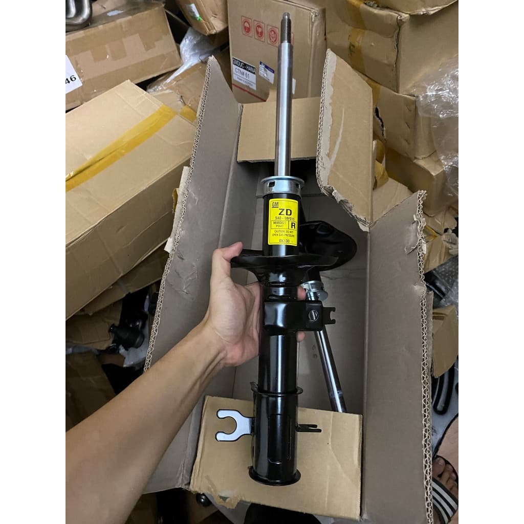 Giảm xóc trước Gentra,Aveo hàng GM