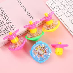 Vỉ 20 chiếc quay bấm phát sáng Đồ chơi Con quay lên cót có đèn led cực đẹp 2