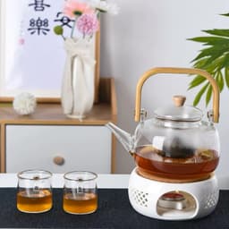 Đế đun nến gốm sứ trắng làm nóng trà. Đế giữ nóng trà bằng nến 5