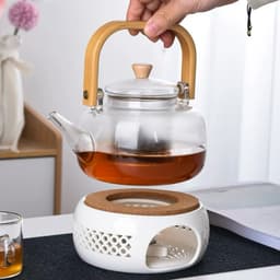 Đế đun nến gốm sứ trắng làm nóng trà. Đế giữ nóng trà bằng nến 6