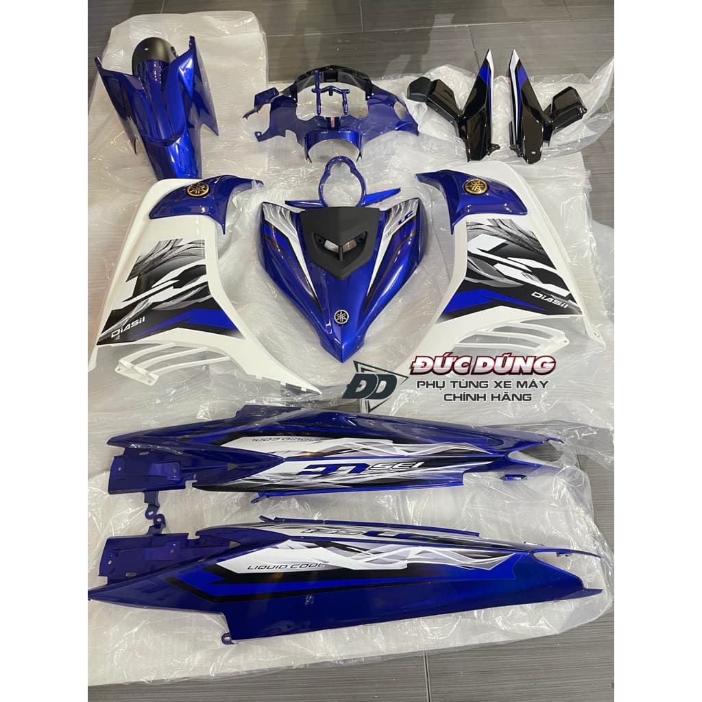   Áo nhựa xe Exciter 135 2011 đến 2014 trắng xanh co tem