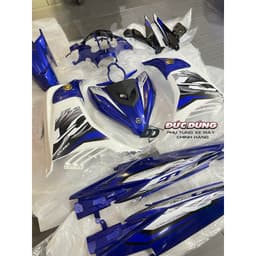   Áo nhựa xe Exciter 135 2011 đến 2014 trắng xanh co tem 2