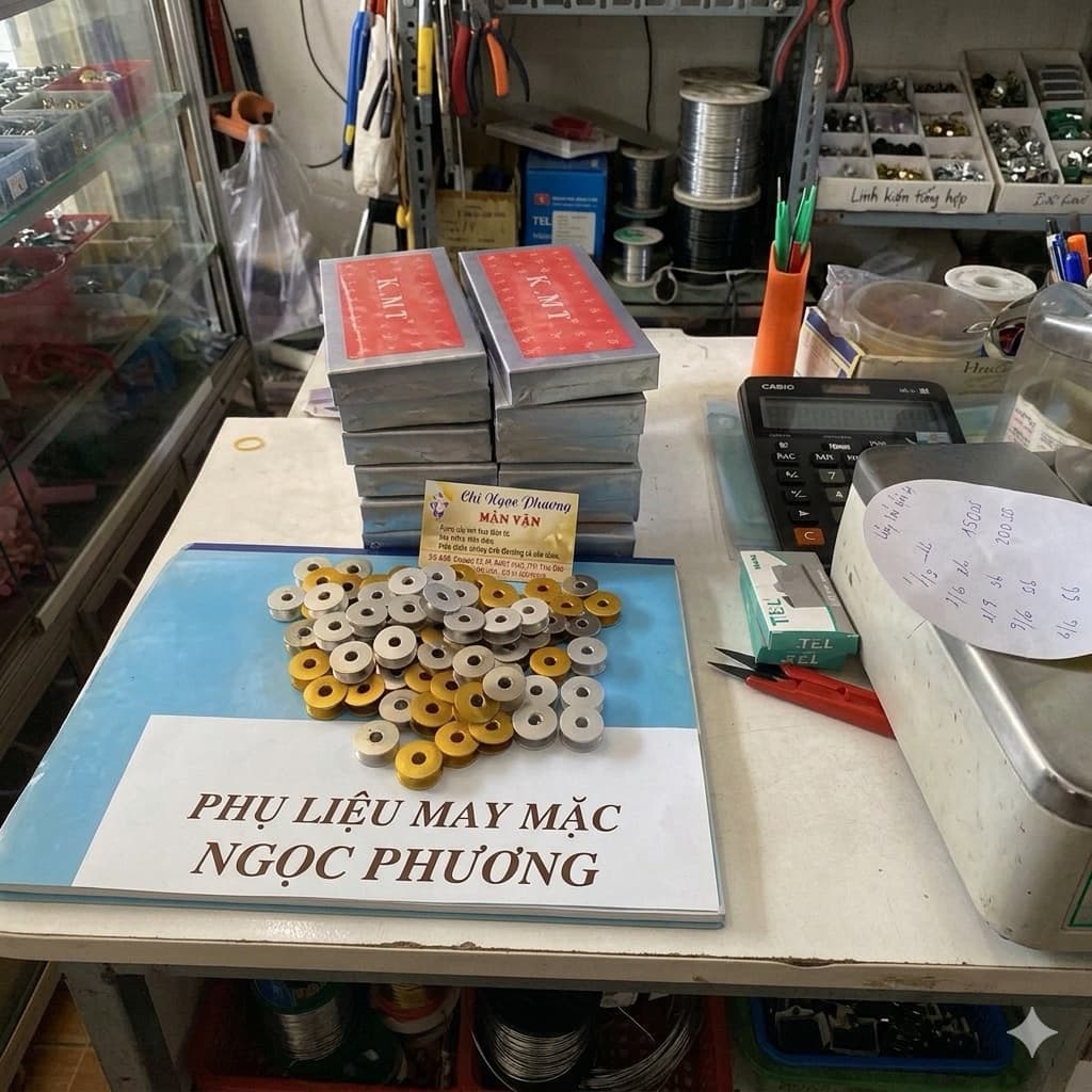 Hộp 100 con suốt nhôm vàng sử dụng cho máy may 1 kim công nghiệp