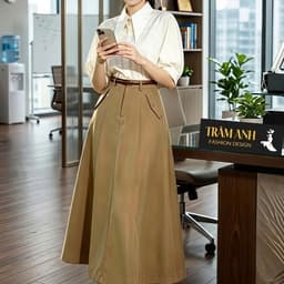 Thời trang công sở-chân vây dáng dài - thanh lịch,hiện đại.Form váy:dáng chữ A dài midi,độ xòe nhẹ 2