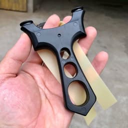 Ná cao su nhựa 3 lỗ - kèm 1 dây , combo ná nhựa abs nguyên khối + dây kéo tới má 2