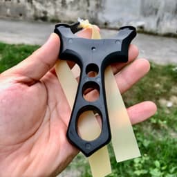 Ná cao su nhựa 3 lỗ - kèm 1 dây , combo ná nhựa abs nguyên khối + dây kéo tới má 8