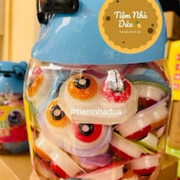 Lọ 50c thạch hình mắt đôi hộp hình con gấu đeo kính siêu yêu cho bé, thạch lọ gấu hình mắt siêu ngon 2