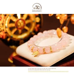 Ngọc Đan Tâm - Vòng Tay Thạch Anh Hồng 10mm 4A Phối Charm Bánh Xe Pháp Luân 6