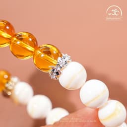 Ngọc Đan Tâm - Vòng Tay Hoàng Bạch ( Thạch Anh Vàng 5A 9mm + Vỏ Sò Tai Tượng 3A 10mm ) 6
