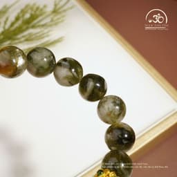 Ngọc Đan Tâm - Vòng Tay Mắt Rồng Xanh Phối Charm Hạt Trống Zakiram 10mm 2A 5