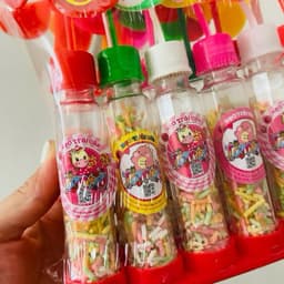 Bán sỉ lốc 12c Kẹo trái cây hình đồ chơi chong chóng 12 cái , đồ ăn vặt cổng trường siêu Hot 2
