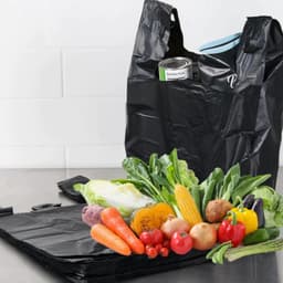 1Kg Túi nilong đen đẹp, dẻo, dai, hai quai không hôi dùng gói hàng, đựng rác size 10kg và 15kg. Màng PE đen 2