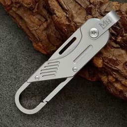 Móc Khóa Titan Đa Năng Tích Hợp Công Cụ Khui Thùng Bưu Phẩm Mini EDC Cao Cấp - Phụ Kiện Cắt Gọt Mở Thùng Hàng Gấp Gọn 1