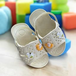 Dép tổ ong cho bé tập đi có dây chun co giản chống tuột chất liệu eva mềm, êm chân giúp bé thoải mái đi lại 1