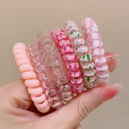 Bộ 6 dây buộc tóc xoắn lò xo nhiều màu sắc, phong cách và tiện dụng cho mọi kiểu tóc. 1