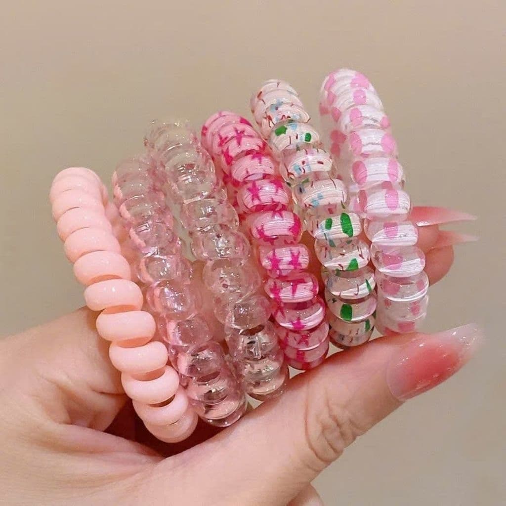 Bộ 6 dây buộc tóc xoắn lò xo nhiều màu sắc, phong cách và tiện dụng cho mọi kiểu tóc.
