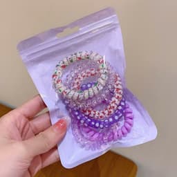 Bộ 6 dây buộc tóc xoắn lò xo nhiều màu sắc, phong cách và tiện dụng cho mọi kiểu tóc. 3