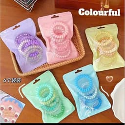 Bộ 6 dây buộc tóc xoắn lò xo nhiều màu sắc, phong cách và tiện dụng cho mọi kiểu tóc. 4