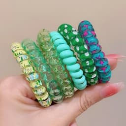 Bộ 6 dây buộc tóc xoắn lò xo nhiều màu sắc, phong cách và tiện dụng cho mọi kiểu tóc. 5
