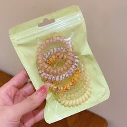 Bộ 6 dây buộc tóc xoắn lò xo nhiều màu sắc, phong cách và tiện dụng cho mọi kiểu tóc. 6