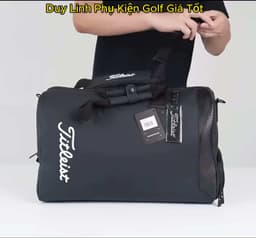 Titleist Men's and Women's Golf Clothing Bag, Made of Soft Pu Leather, Water-Resistant, Stain-Resistant, with Shoe Compartment and Shoulder Strap. 1